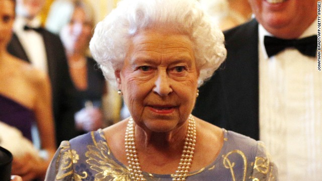 Queen Elizabeth II looks on during a reception for the Royal National Institute for the Blind held at St James Palace in London on June 3, 2013. 
