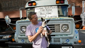 Bob Votruba, accompanied by his Boston terrier, Bogart, travels across the country to spread kindness.