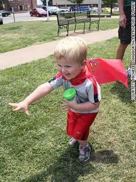 Kids make their own supercapes during the Make a Cape event, which invariably give them the ability to fly, albeit at very low altitude.