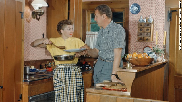 Williams and her husband, Ben Gage, prepare dinner circa 1950. 