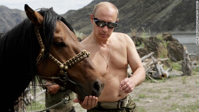 Putin vacations outside the town of Kyzyl in Southern Siberia in 2009. Over the years he has earned <a href='http://www.cnn.com/2012/03/02/europe/gallery/cult-of-vladimir-putin/index.html'>a reputation as a “strongman,”</a> declaring a crackdown on Chechen militants a priority in his first presidential term. ” border=”0″ height=”360″ id=”articleGalleryPhoto007″ style=”margin:0 auto;display:none” width=”640″/><cite style=