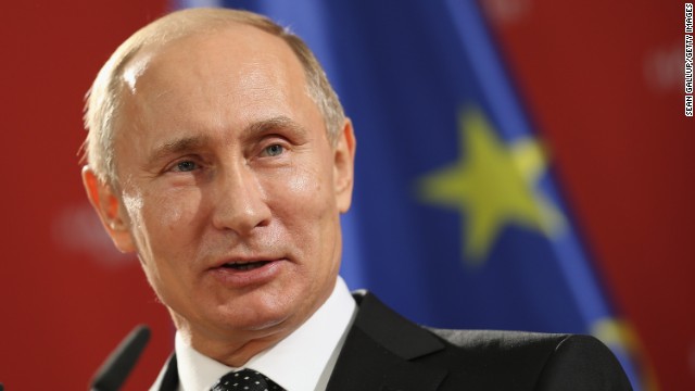 Putin addresses the media during his visit to Hanover on April 8. 