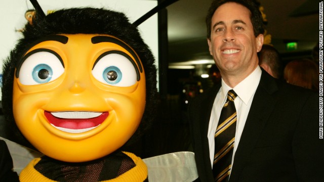 Jerry Seinfeld appears with a giant, costumed bee for a premiere of his film "Bee Movie" in November 2007 in Brussels, Belgium. 