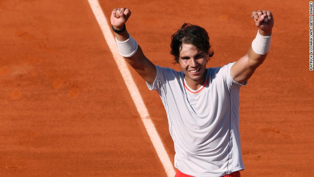Spain's Rafael Nadal celebrates after defeating Serbia's Novak Djokovic during a French Open semifinal match in Paris on June 7. Nadal won 6-4, 3-6, 6-1, 6-7(3), 9-7.