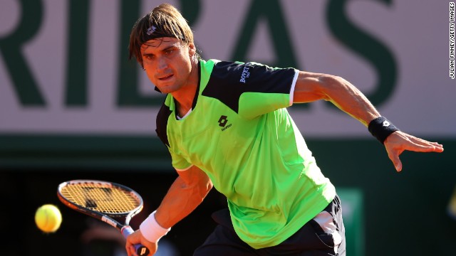 Ferrer plays a forehand to Tsonga on June 7.