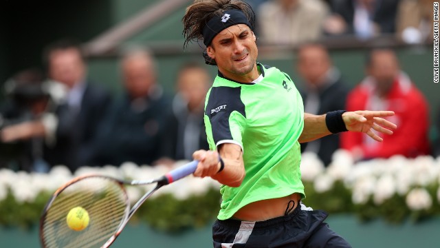 Ferrer plays a forehand to Nadal on June 9.