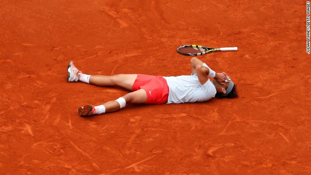 Rafael Nadal of Spain reacts after winning match point against David Ferrer of Spain during the men's singles final match of the French Open at Roland Garros Stadium in Paris, on Sunday, June 9. Nadal won 6-3, 6-2, 6-3.