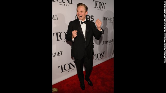 Billy Magnussen enjoys himself on the red carpet.