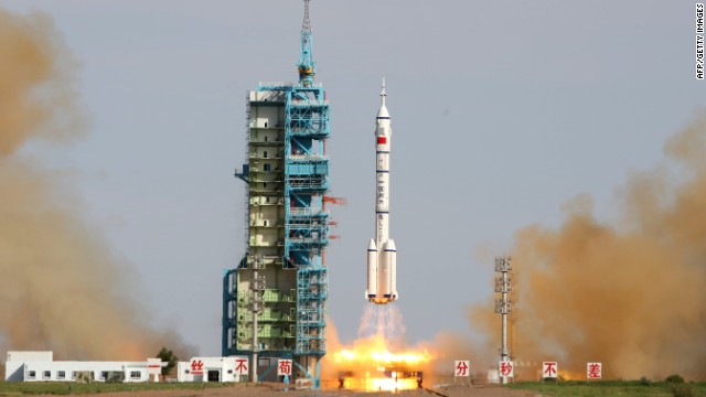 China's Shenzhou-10 rocket blasts off from the Jiuquan space centre on June 11, 2013. 