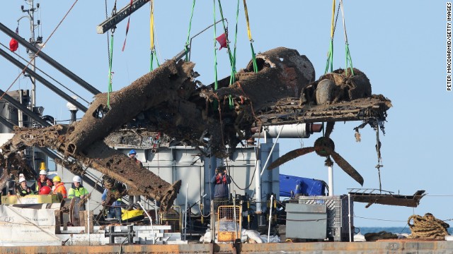 The aircraft is lifted from the waters of the English Channel. It was first spotted on the floor of the channel by divers in 2008.