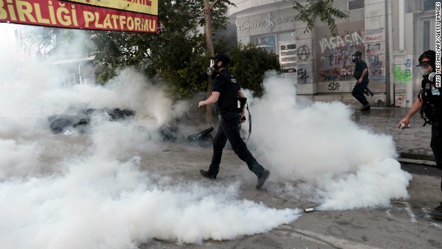 Police enter Taksim Square during clashes with protesters on June 11.