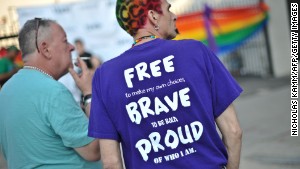 Men attend the 2013 Capital Pride parade in Washington on June 8\n