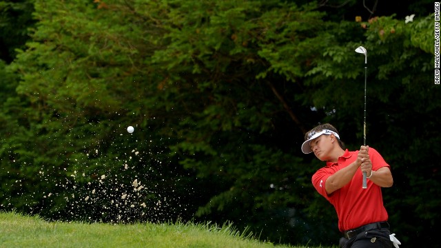 Ryan Yip of Canada hits his second shot out of a bunker on the 10th hole on June 13.