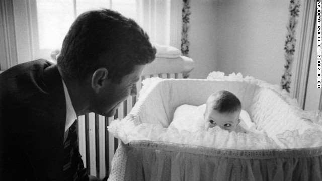 John F. Kennedy with daughter Caroline, 1958.