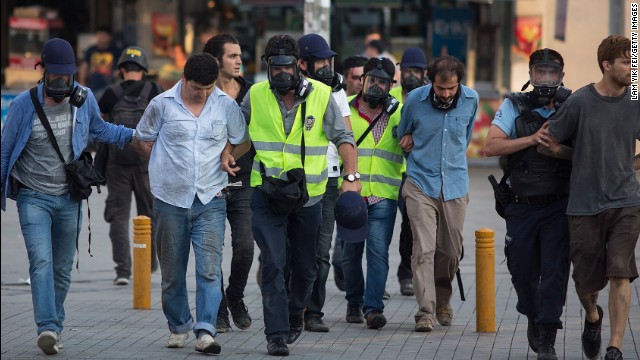 Police detain protesters after a crackdown on a demonstration at Istanbul's Gezi Park on June 16.