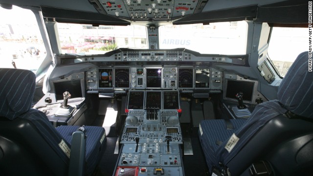 Inside the cockpit of the Airbus A380 at Le Bourget airport on June 12, 2005 after the plane landed near Paris. It became one of the star attractions of that year's show completing several aerial demonstrations above the airfield for visitors and buyers. 