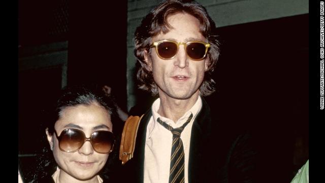 On December 8, 1980, an armed man, Mark Chapman, staked out the Manhattan apartment building where former Beatle John Lennon lived with his wife, Yoko Ono, and their young son. After receiving a signed copy of Lennon's latest album as the singer was leaving his home, Chapman waited until the couple returned to the apartment that night and shot Lennon in the back with a revolver. In this photo taken earlier that year, Lennon and Ono stand outside of the recording studio where he recorded his final album "Double Fantasy."