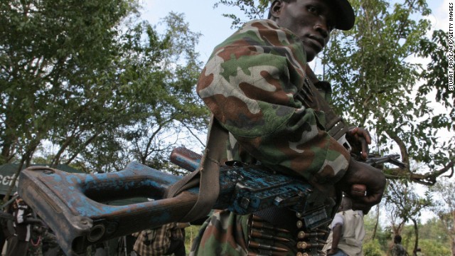 A member of the Lord's Resistance Army stands guard. The group is accused of poaching elephants in the Democratic Republic of Congo's Garamba National Park and using the profits to fund terror activities.