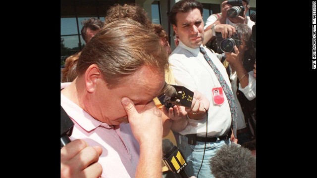 Ron Dwyer pauses to compose himself on July 20, 1996, as he speaks about his 11-year-old daughter Larkyn Lyn Dwyer, who was on TWA Flight 800.