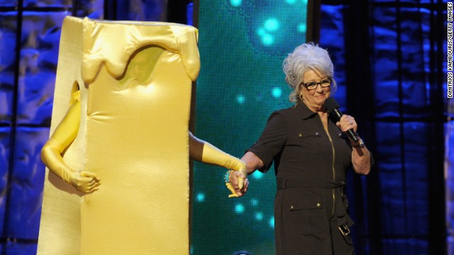 Deen on stage with a costumed Kevin Bacon at Comedy Central's "Night of Too Many Stars: America Comes Together for Autism Programs" in 2012 in New York.