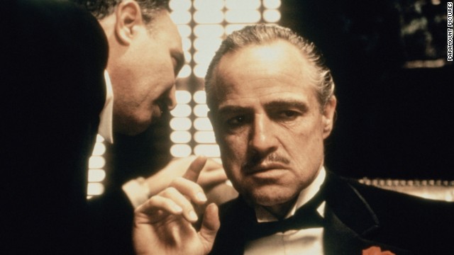 <strong>"The Godfather":</strong> Mario Puzo's 1969 novel chronicles the history of an immigrant and his family making their way in America as part of the Italian Mafia. It was made into an Oscar-winning 1972 film with Marlon Brando, and then expanded for 1974 and 1990 sequels.