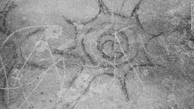 A cross? A comet? A star? This symbol, found in Dunbar Cave in Clarksville, Tennessee, is commonly seen in religious iconography from the 1300s. 