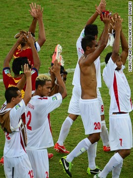 Tahiti's players lap up the acclaim from the stands at the end of the match.