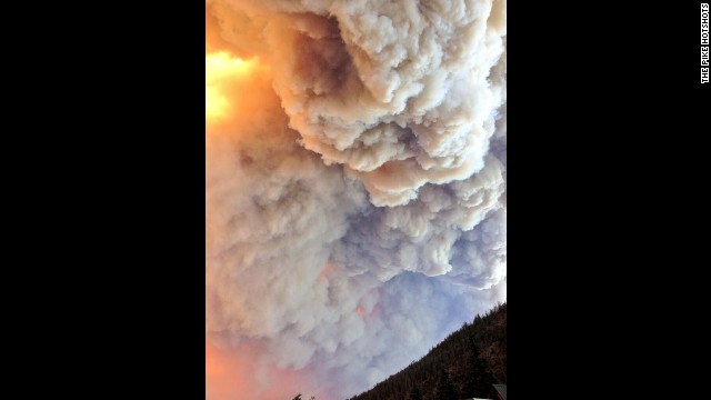 Smoke from the West Fork Fire Complex consisting of the West Fork and Windy Pass fires fills the sky on June 20.