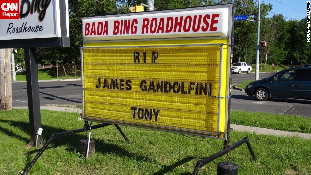 Art Frewin named his Wellin, Ontario, bar the "Bada Bing Roadhouse," inspired by "The Sopranos," and paid tribute on the sign outside his establishment when he heard the news. "I was sorry to see Tony ... James pass away. We'll always know him as Tony, you know. I thought he was a brilliant actor who played a brilliant part. I was very taken aback. 51 is way too young."