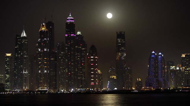  The supermoon is seen behind the Marina district towers in Dubai, United Arab Emirates, on June 23.