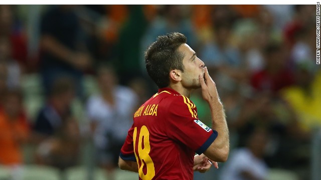 Jordi Alba wheels away in celebration after scoing his second goal and Spain's third against Nigeria.