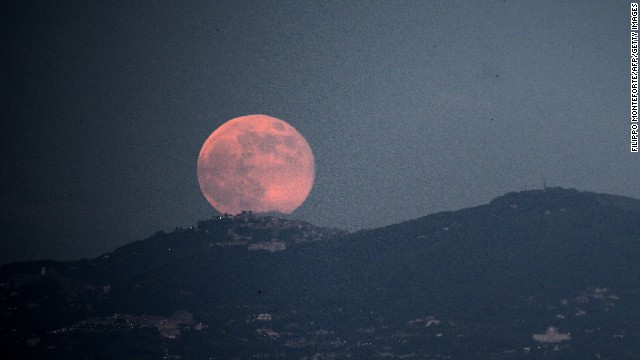 The supermoon rises over Rome on June 23.