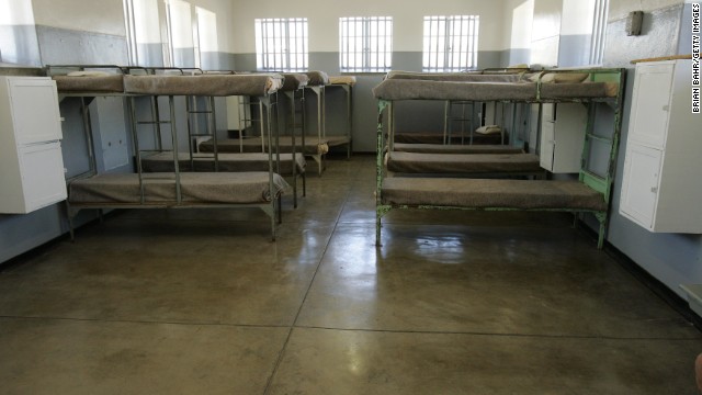 Group prison barracks sit empty in the facility.