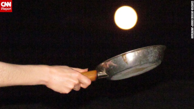 <a href='http://ireport.cnn.com/docs/DOC-994228'>Joyce Kelley Clinton </a>and her husband, Andy, wanted to flip some supermoon pancakes for their creative photograph. "We did not know how difficult it would be to arrange the photo so that the moon was an equivalent size with the pan," she said. "It required a lot of crouching, shifting, stepping, lifting, and maneuvering. And also giggling."