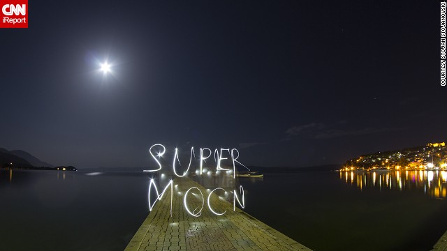 Astronomy lover and photographer <a href='http://ireport.cnn.com/docs/DOC-994166'>Stojan Stojanovski</a> wanted to remember the brightest supermoon of 2013 in a creative way. He photographed it in Ohrid, Macedonia, while tracing the word "supermoon" with a flashlight that he captured at a slow shutter speed. 