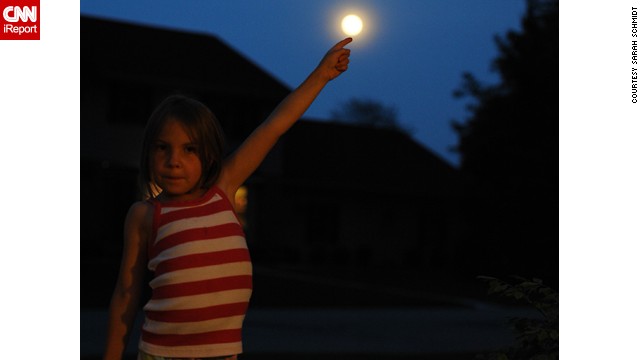 <a href='http://ireport.cnn.com/docs/DOC-994716'>Sarah Schmidt</a> captured her daughter Katelyn in an E.T.-inspired pose in Neenah, Wisconsin.