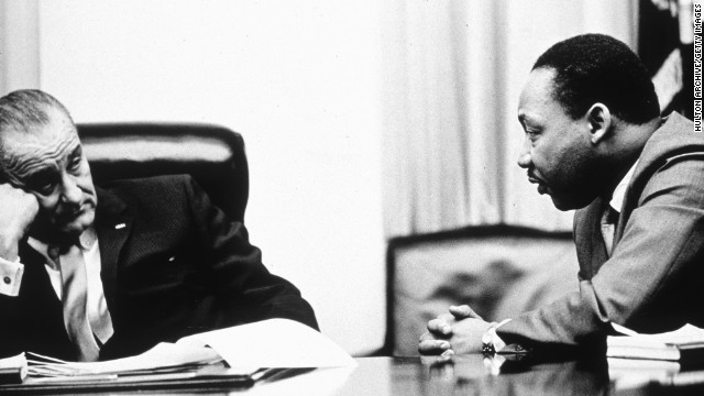 President Lyndon Johnson, pictured here discussing the act with the Rev. Martin Luther King Jr. in 1965, went on national television to call for passage of the Voting Rights Act. He ended his speech by saying, "And we shall overcome."