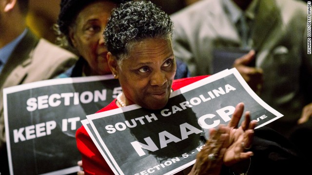 A supporter of the Voting Rights Act rallies in the South Carolina State House in Columbia on February 26, 2013, the day before oral hearings at the Supreme Court.