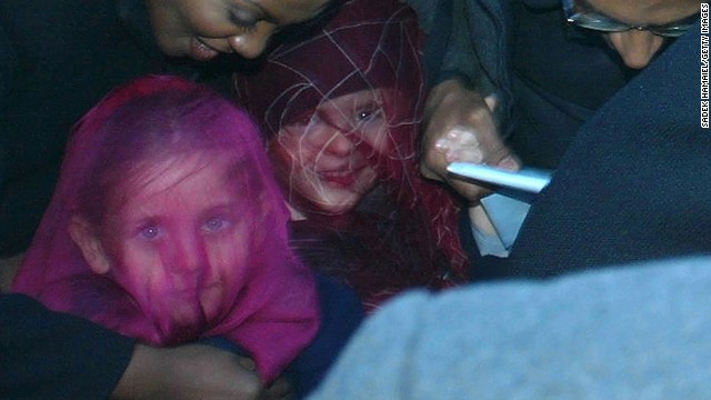 To protect their privacy in public, Jackson would cover his kids' faces with masks and other obscuring accessories. Here, under the gauzy veils, are Paris and Prince during a trip to the Berlin Zoo in 2002. 