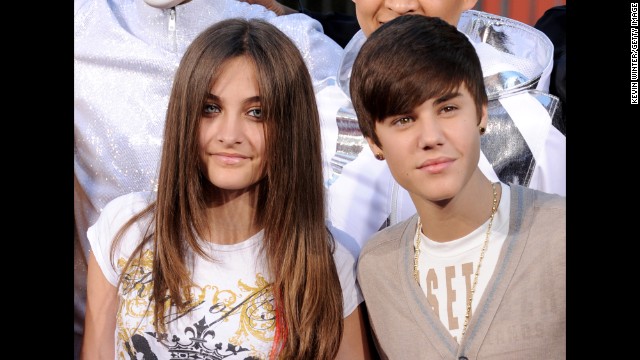 Paris poses with Justin Bieber at the Michael Jackson hand and footprint ceremony at Grauman's Chinese Theatre in 2012. Bieber has called Jackson "an inspiration and an icon." (The famous landmark is now called TCL Chinese Theatre).