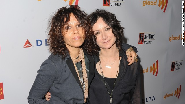 Musician Linda Perry and actress Sara Gilbert got engaged in 2013, which Gilbert announced on "The Talk," where she serves as one of the moderators. 