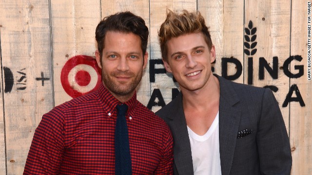 Interior design guru Nate Berkus and Jeremiah Brent were photographed <a href=' http://www.usmagazine.com/celebrity-news/news/nate-berkus-and-jeremiah-brent-kiss-after-engagement-wear-matching-denim-outfits-2013184' >engaging in some PDA</a> after their engagement in April 2013. 