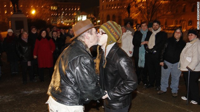 Olin Burkhart, left, and Carl Burkhart kiss on the steps of the New Hampshire Capitol in January 2010 after the state's law allowing same-sex marriage went into effect.