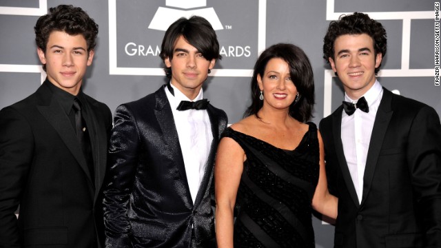 Nick, Joe and Kevin Jonas, better known as the Jonas Brothers, attend the 2009 Grammy Awards with their mother, Denise Jonas. Denise often makes guest appearances on Kevin's E! reality show "Married to Jonas."