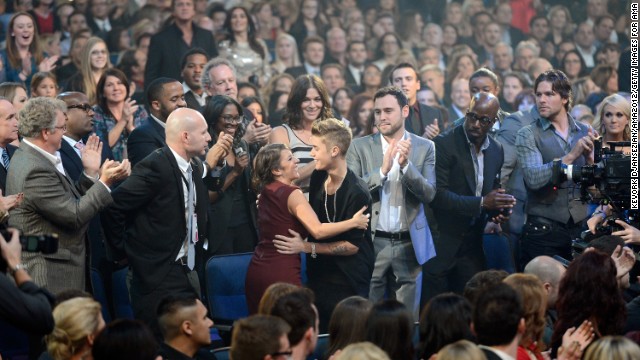 Singer Justin Bieber and his mother, Pattie Mallette, share a hug at the American Music Awards. Mallette released a book in 2012 titled "Nowhere but Up: The Story of Justin Bieber's Mom" that chronicled her rise from being a teen mom with drug and alcohol addiction.