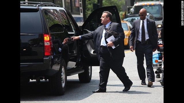 New Jersey Gov. Chris Christie departs the funeral.