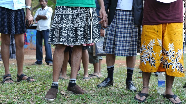 Men in Bangalore, India, wear skirts on January 12, 2013, during a demonstration against the <a href='http://www.cnn.com/2013/04/22/world/asia/india-rape-sexism/index.html?iref=allsearch' target='_blank'>rape and sexual abuse of women</a>.