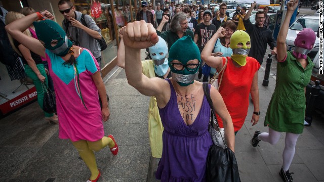 <a href='http://www.cnn.com/2012/08/17/world/pussy-riot-social-media/index.html'>Supporters of the Russian punk band Pussy Riot</a> wear masks and tape their mouths during a protest in front of the Russian embassy in Warsaw on August 17, 2012. The colorful ski masks were popularized by the feminist rockers.