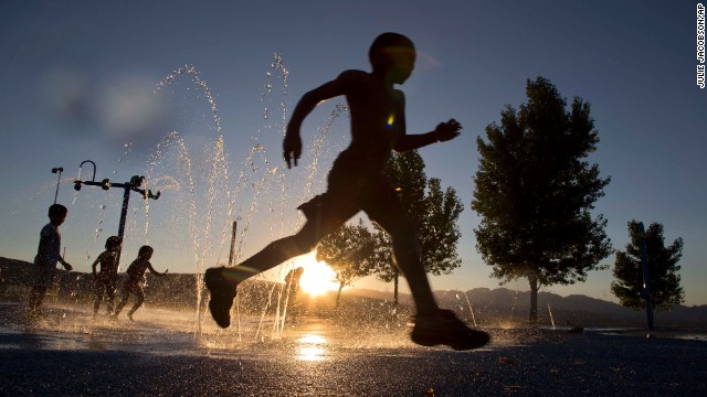 Ashawn Rabb, 5, runs through a fountain at the Red Ridge Park in Las Vegas on June 27.
