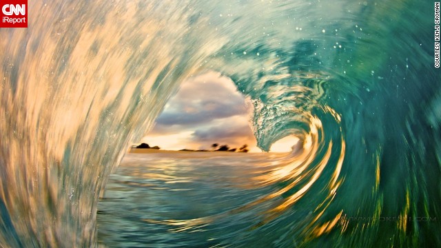 Kenji Croman captured this <a href='http://ireport.cnn.com/docs/DOC-831391'>wave at sunrise</a> by wading into the surf and holding up his camera (protected by a heavy-duty waterproof case). He tries for such images almost every morning. "I usually have to take about 700 shots to get one," he said.